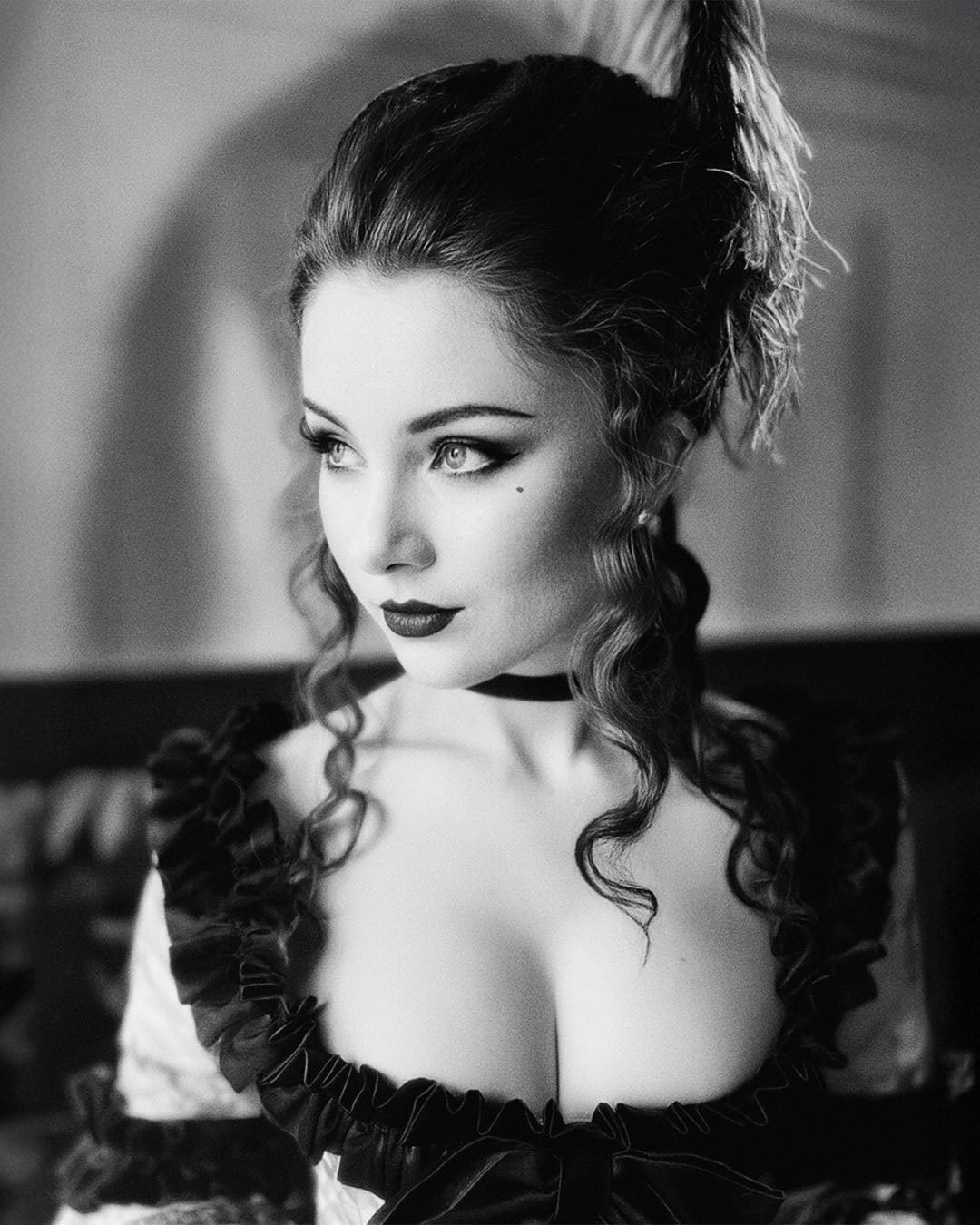 Black-and-white portrait of Megan Tremethick in a period gown