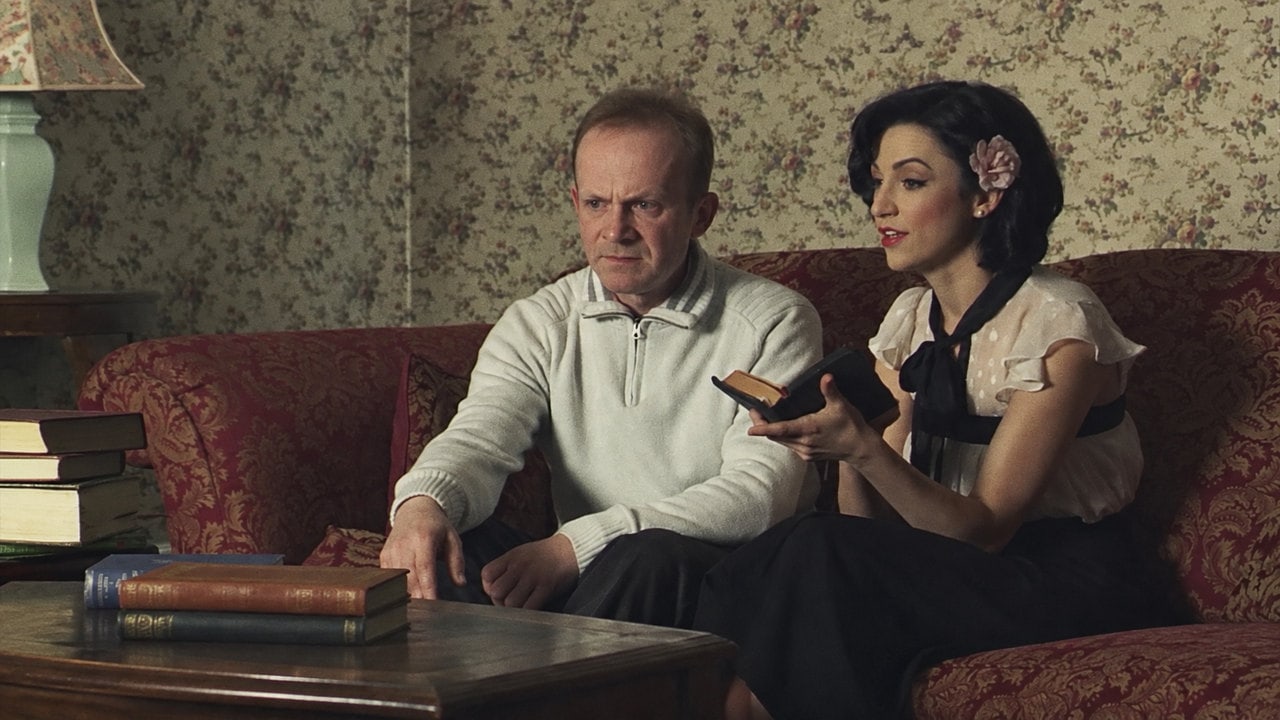Two characters seated together in Lord of Tears